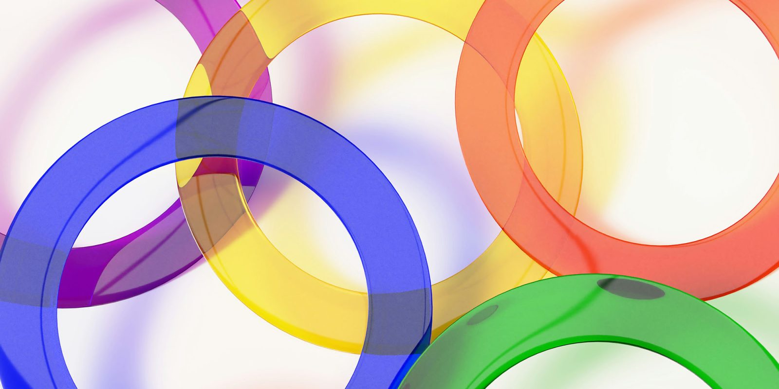 Even as a minimalist, I'm looking forward to a more dimensional iOS 19 | Overlapping, translucent colorful rings graphic
